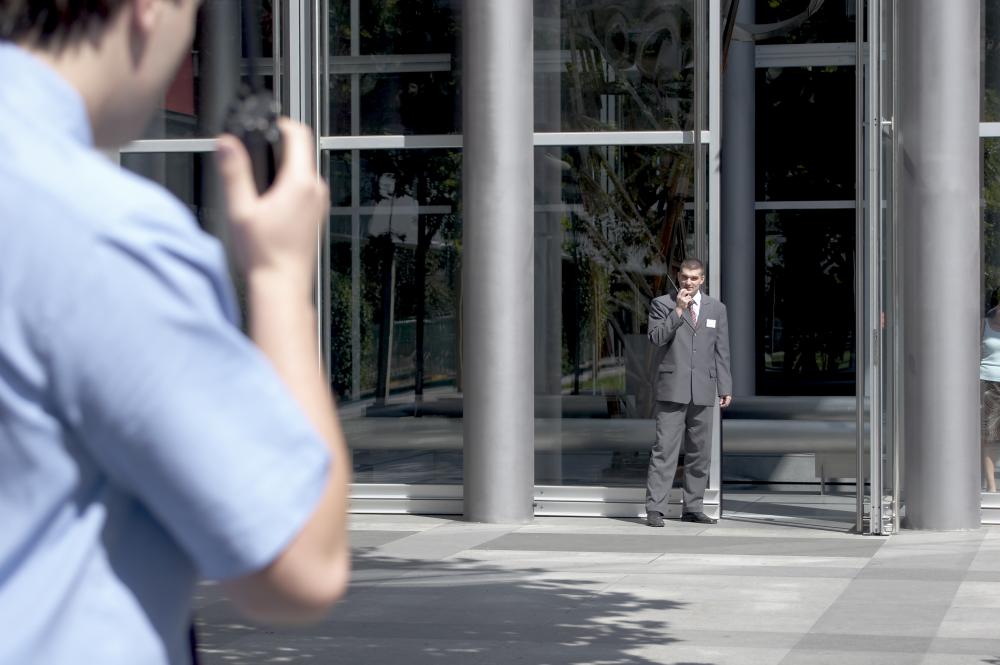 security guards communicating with walkie talkies