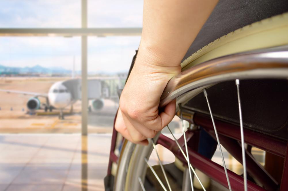 man in a wheelchair at the airport