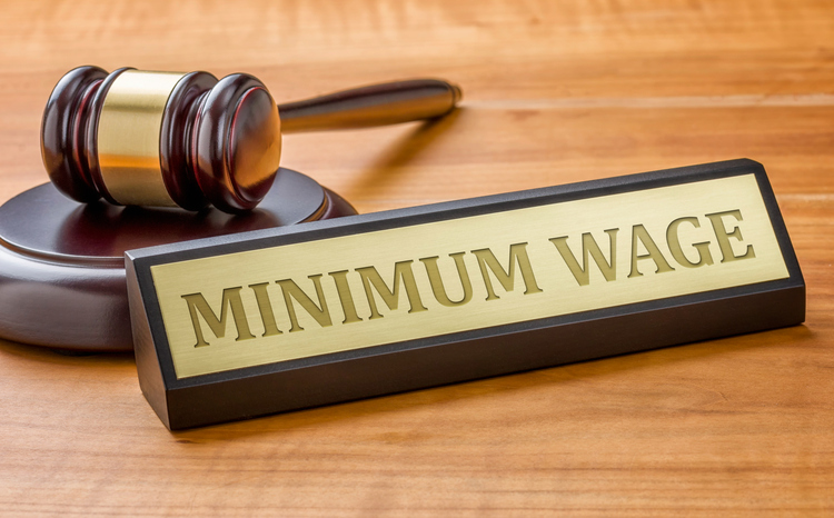 "minimum wage" plaque with mallet and gavel