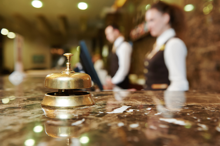 close up of service bell on concierge desk
