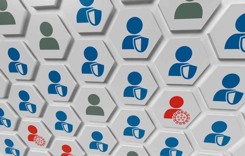 hexagonal shapes patterned with icons indicating vaccinated, unvaccinated, and sick persons