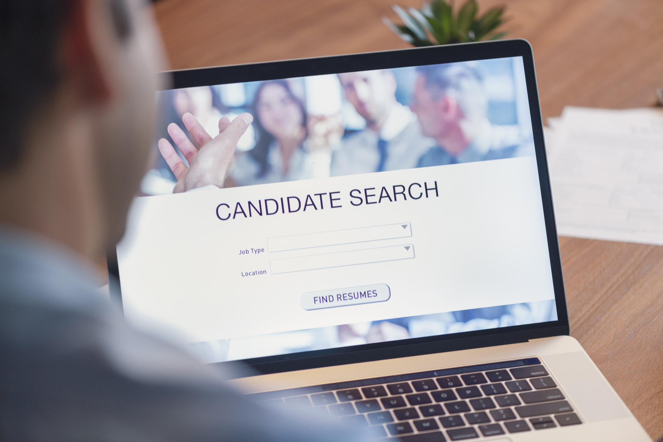 businessman views a recruiting website