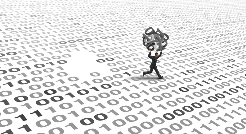 data breach concept: figure taking ones and zeroes