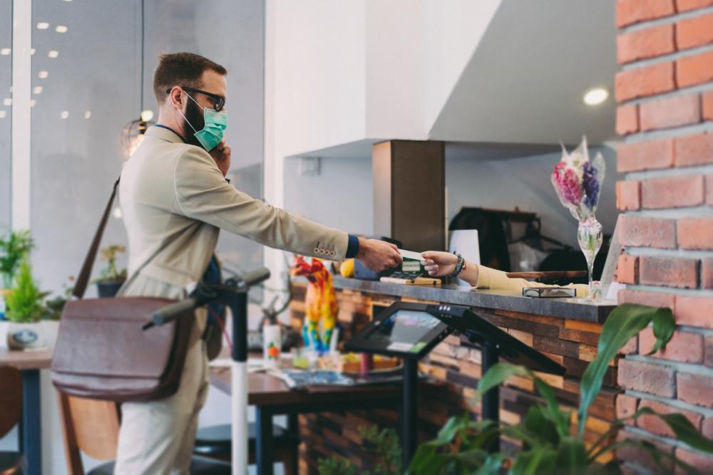 businessman checking into hotel